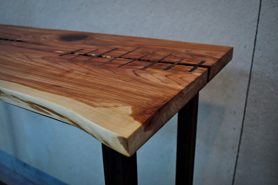 Eastern Red Ceder with walnut inlay top. Walnut base